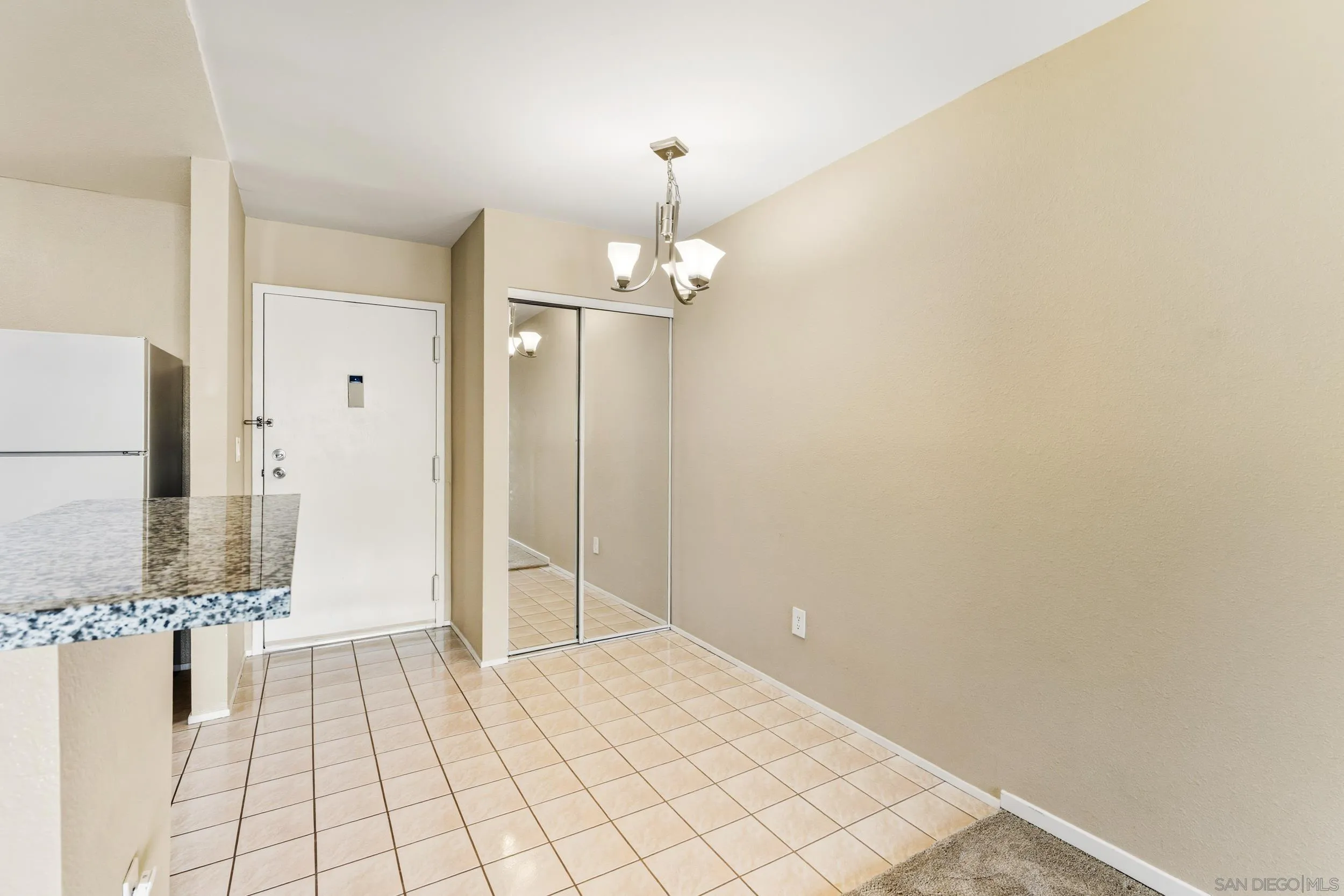 6255 Rancho Mission Road, Unit 217 San Diego, CA 92108 - Photo 5 of 23 a view of a bathroom with a shower