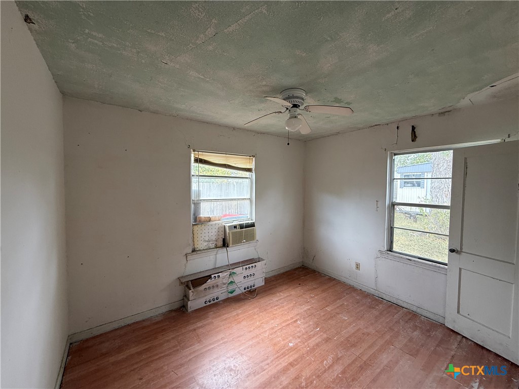 119 Runnels Street Port Lavaca, TX 77979 - Photo 15 of 18 an empty room with windows