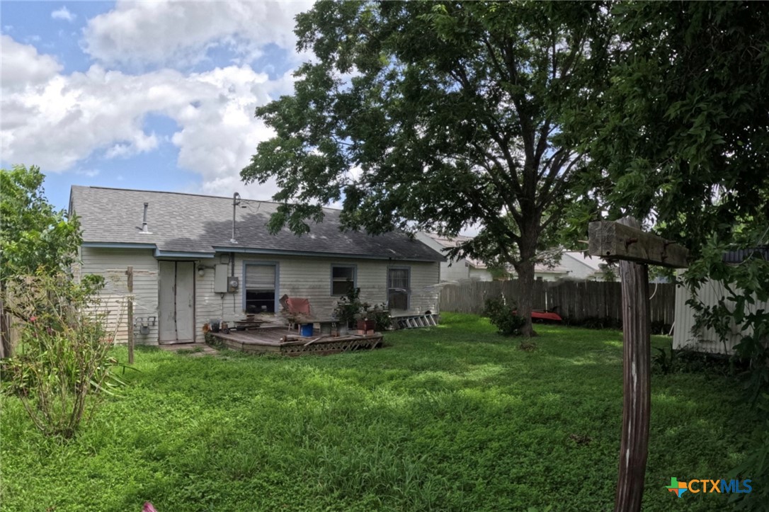 119 Runnels Street Port Lavaca, TX 77979 - Photo 3 of 18 a view of a house with a yard porch and sitting area