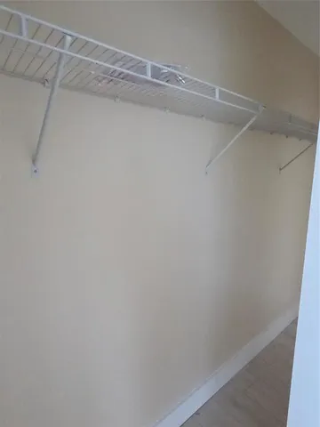 a view of a fountain in front of a house