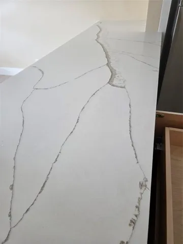 a white toilet and shower