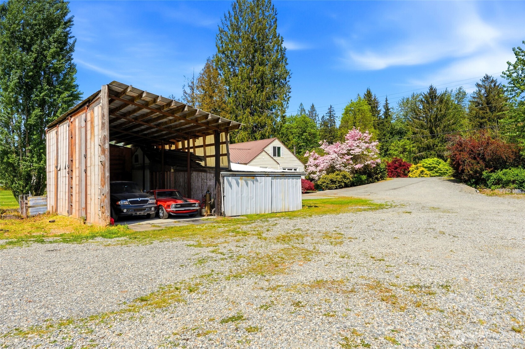 21716 State Rte 530 Northeast Arlington, WA 98223 - Photo 28 of 38 a view of a house with backyard and sitting area