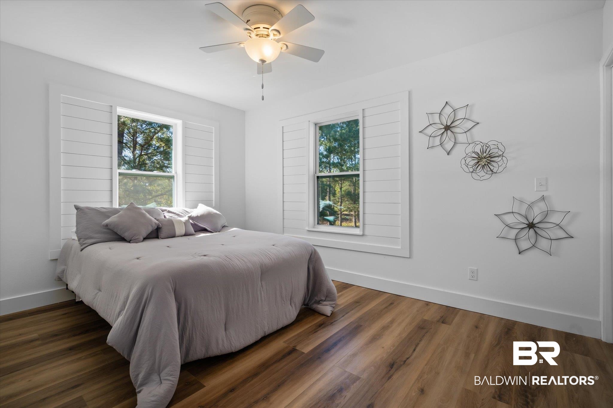 15111 Regus Road Coden, AL 36523 - Photo 10 of 35 Bedroom with wood finished floors, multiple windows, and ceiling fan