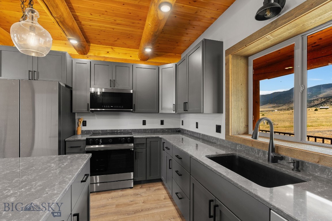 160 Wapiti Road Whitehall, MT 59759 - Photo 13 of 57 Spacious working areas in the kitchen