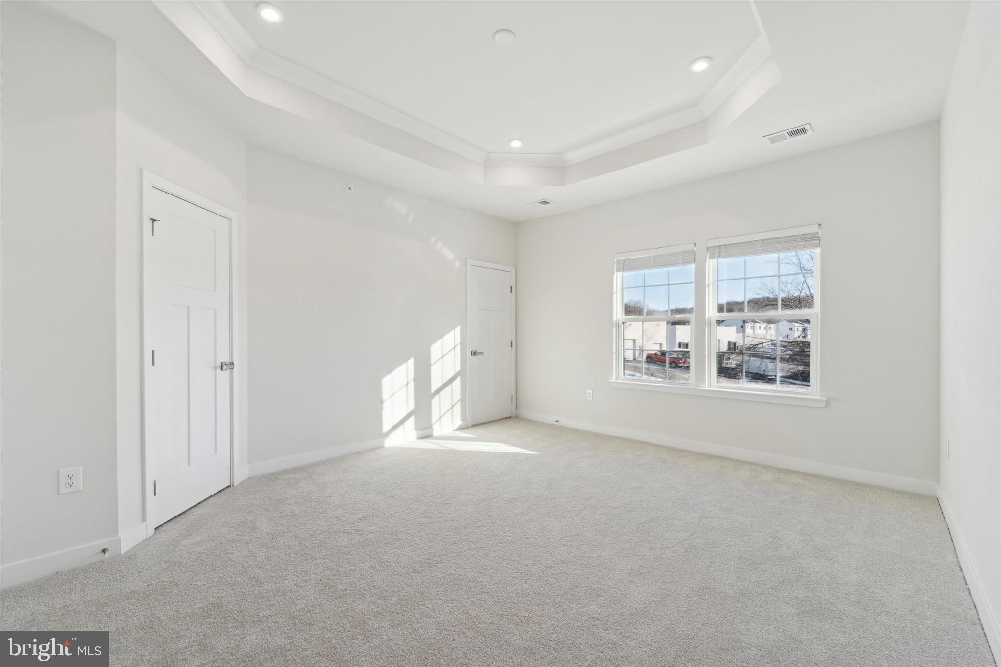 208 River Birch Way Exton, PA 19341 - Photo 14 of 25 a view of an empty room with a window