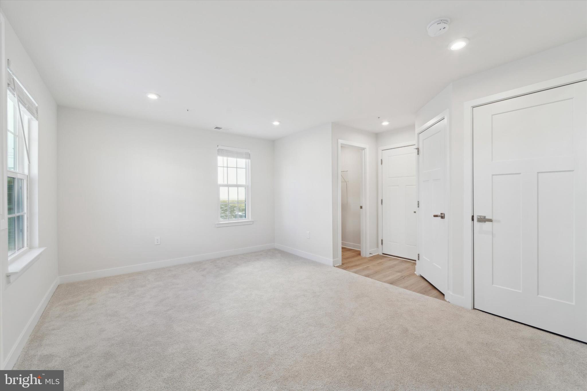 208 River Birch Way Exton, PA 19341 - Photo 3 of 25 an empty room with windows and closet