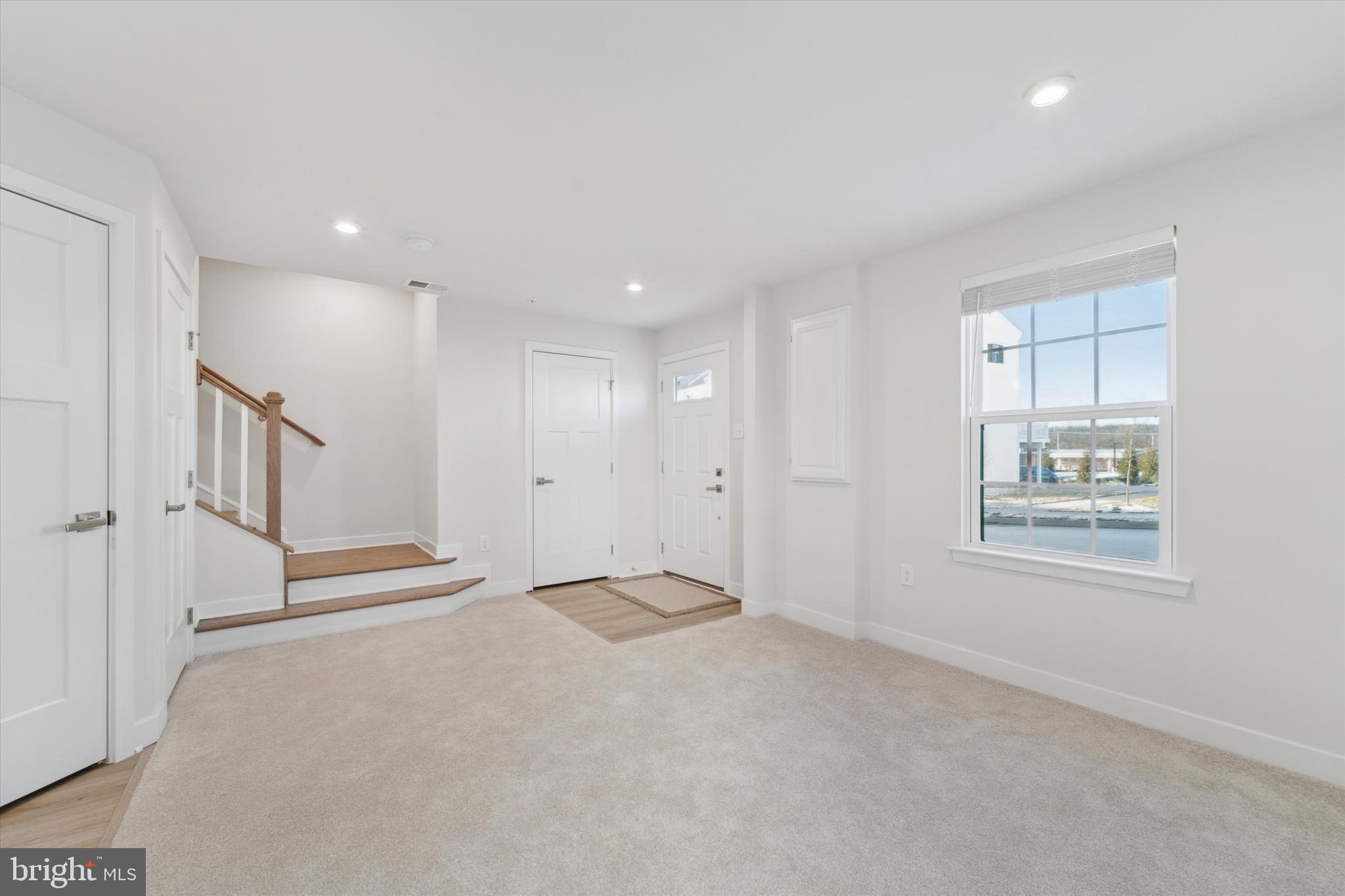 208 River Birch Way Exton, PA 19341 - Photo 5 of 25 a view of an empty room with a window