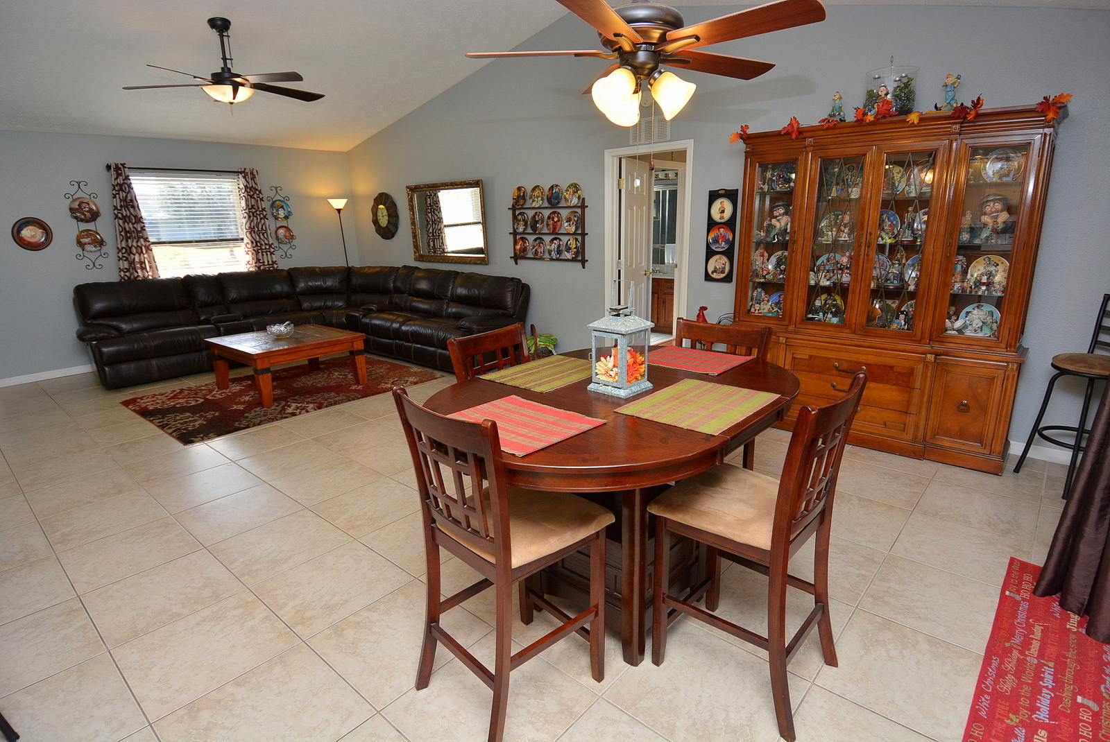 707 Southwest Bond Road Port St. Lucie, FL 34953 - Photo 6 of 25 Dining Room and Living Room