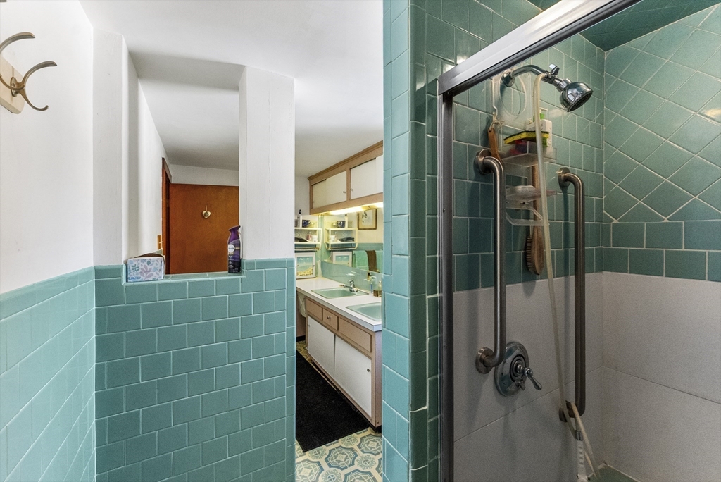 115 Kennedy Road Stoughton, MA 02072 - Photo 29 of 42 a bathroom with a shower and a sink