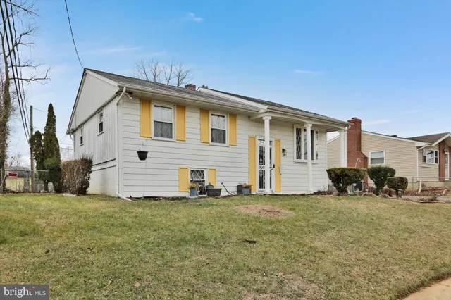 a view of a house with a big yard