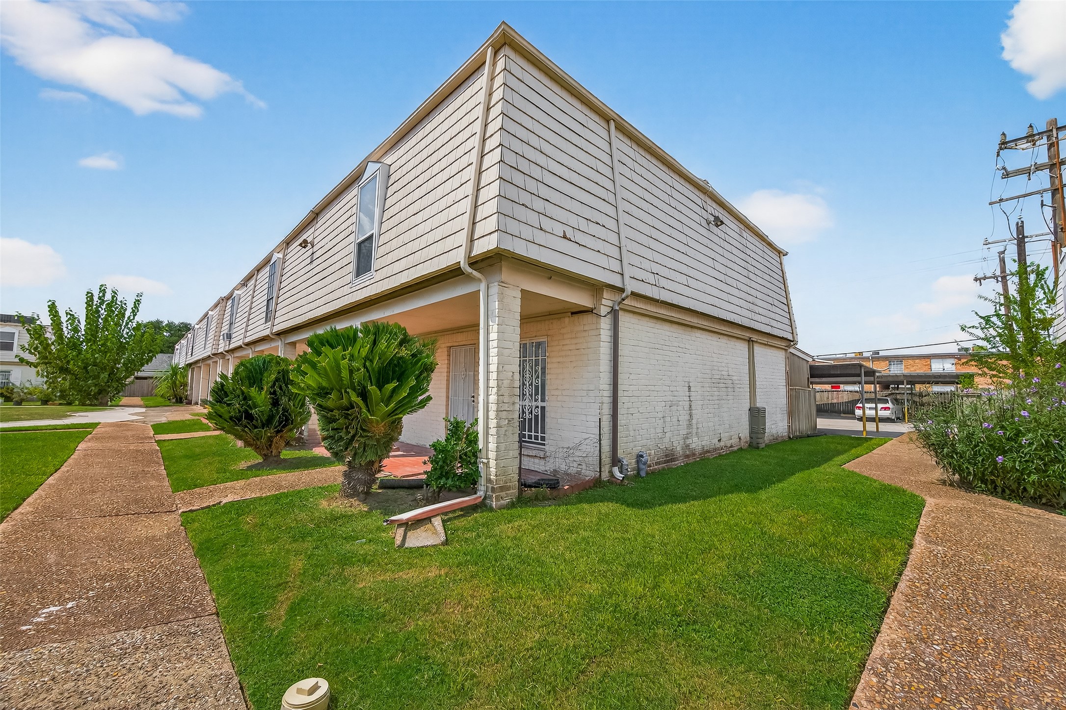 6201 Ranchester Drive, Unit 29 Houston, TX 77036 - Photo 31 of 33 a view of a house with a yard