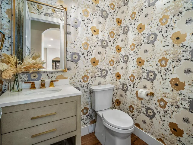 a view of a balcony with a table and chairs