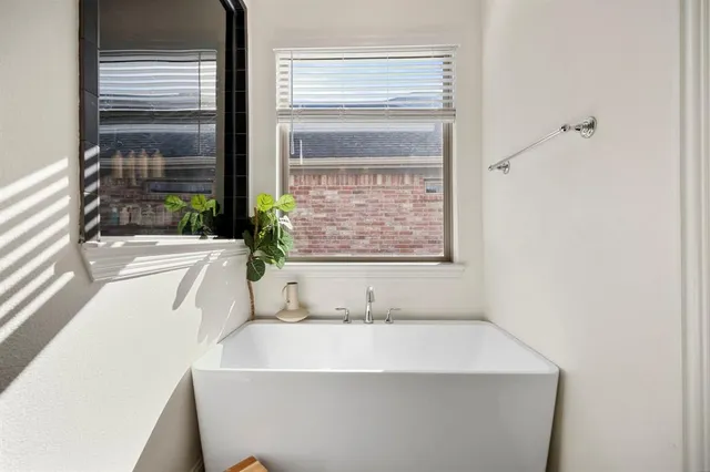 a bathroom with a sink and a bathtub