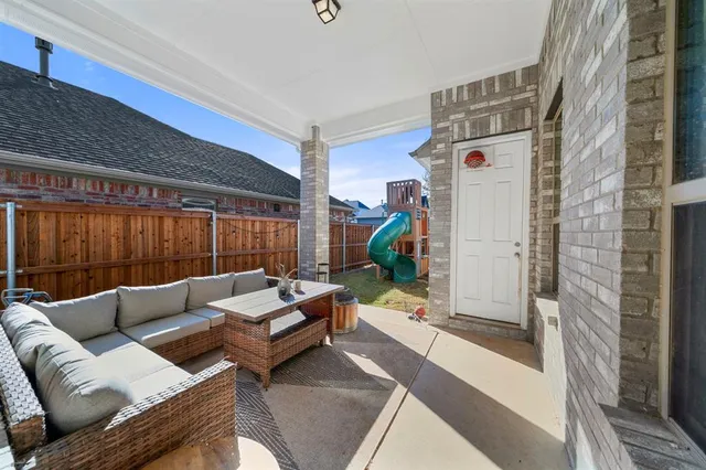 a living room with furniture and a couch