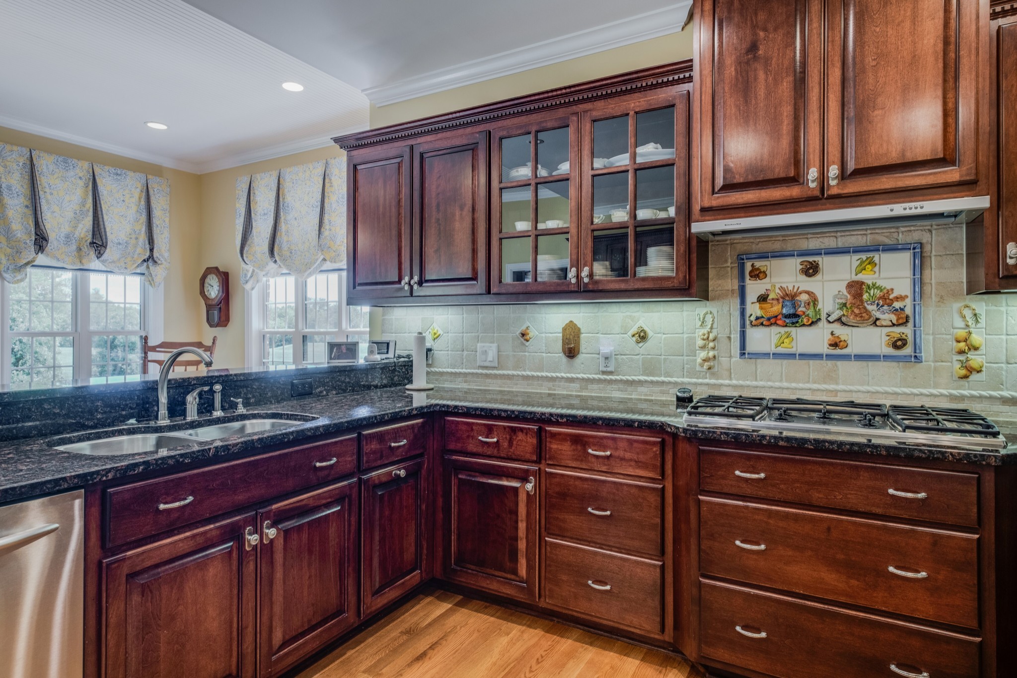 423 Ridgecrest Lane Lebanon, TN 37087 - Photo 19 of 50 a kitchen with granite countertop wooden cabinets and a sink