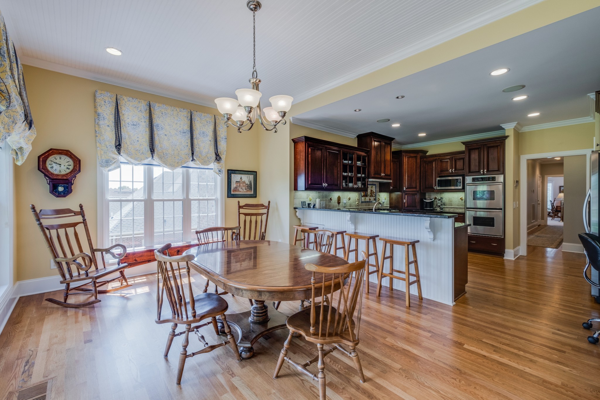 423 Ridgecrest Lane Lebanon, TN 37087 - Photo 22 of 50 a view of a dining room with furniture wooden floor and chandelier