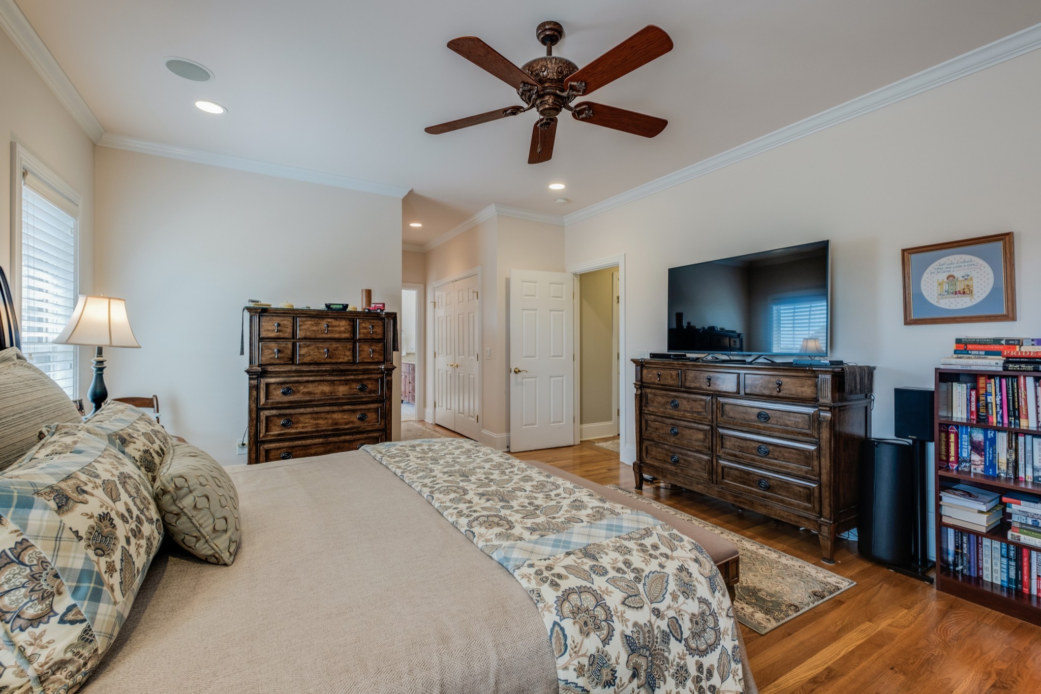 423 Ridgecrest Lane Lebanon, TN 37087 - Photo 24 of 50 a bedroom with a bed dresser and a flat screen tv