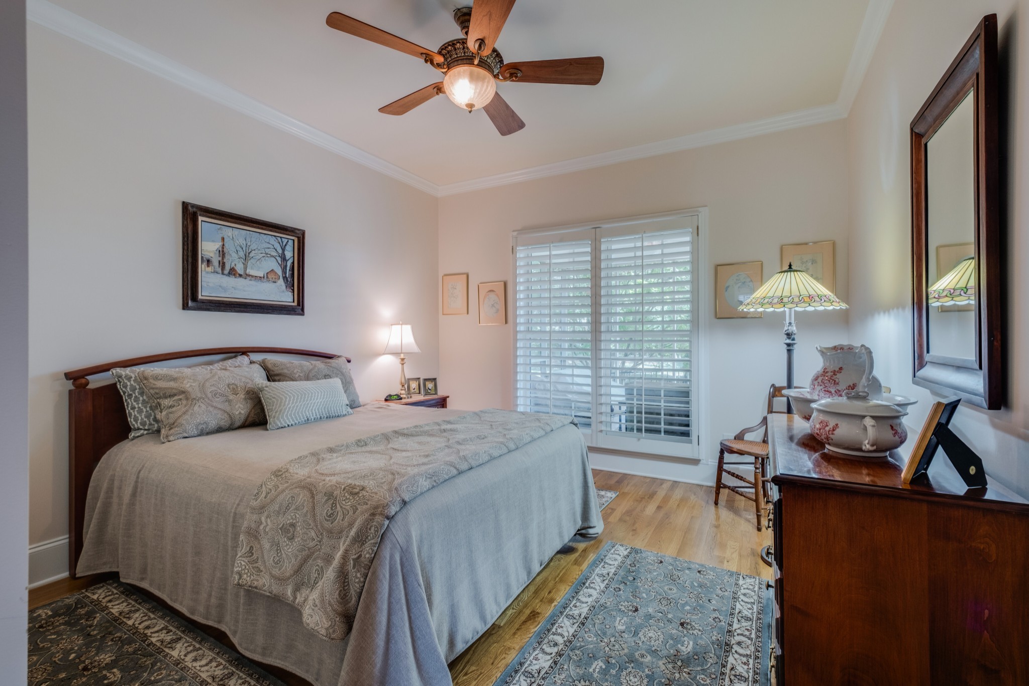 423 Ridgecrest Lane Lebanon, TN 37087 - Photo 31 of 50 a bedroom with a bed and a chandelier