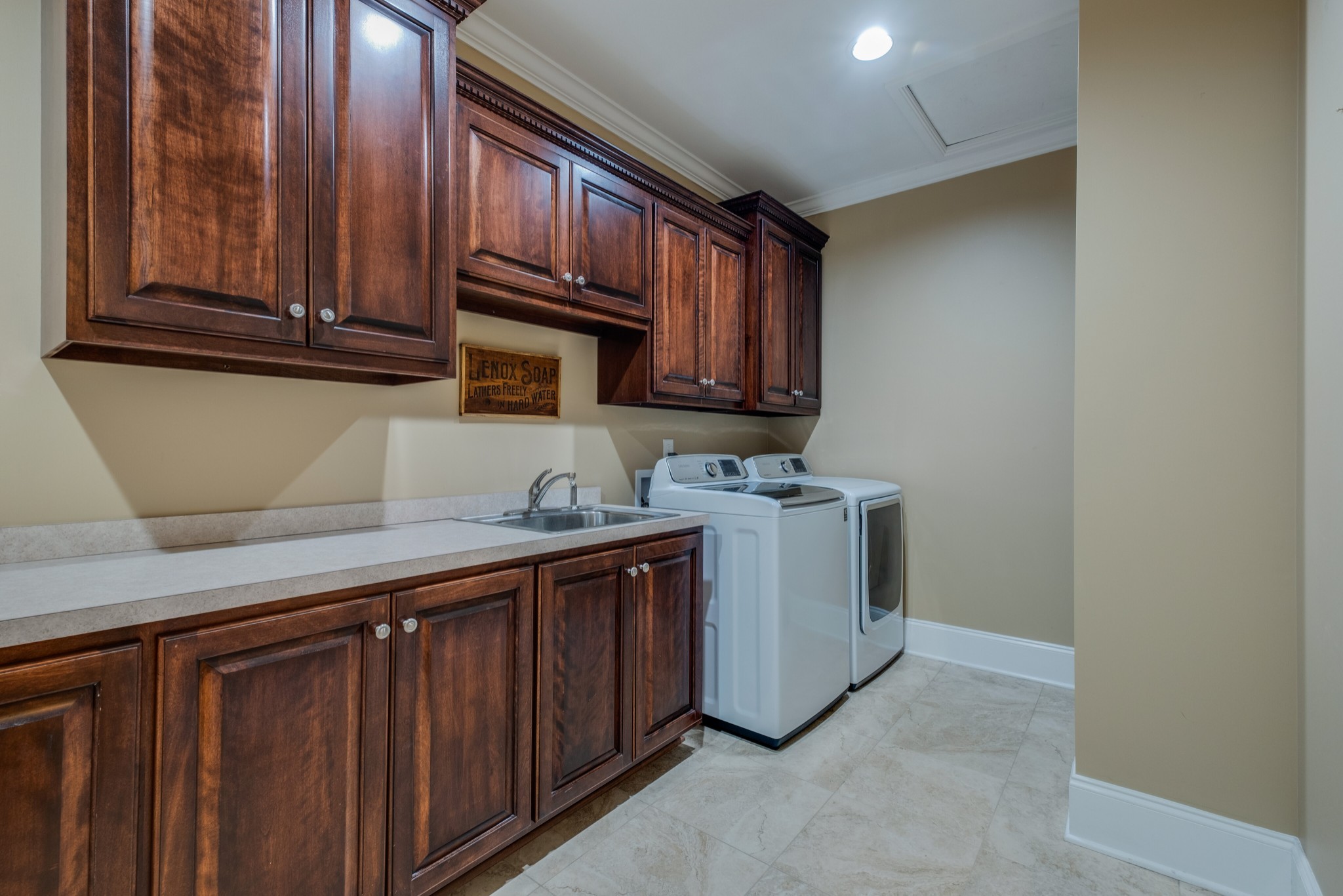 423 Ridgecrest Lane Lebanon, TN 37087 - Photo 33 of 50 a kitchen with wooden cabinets and a sink