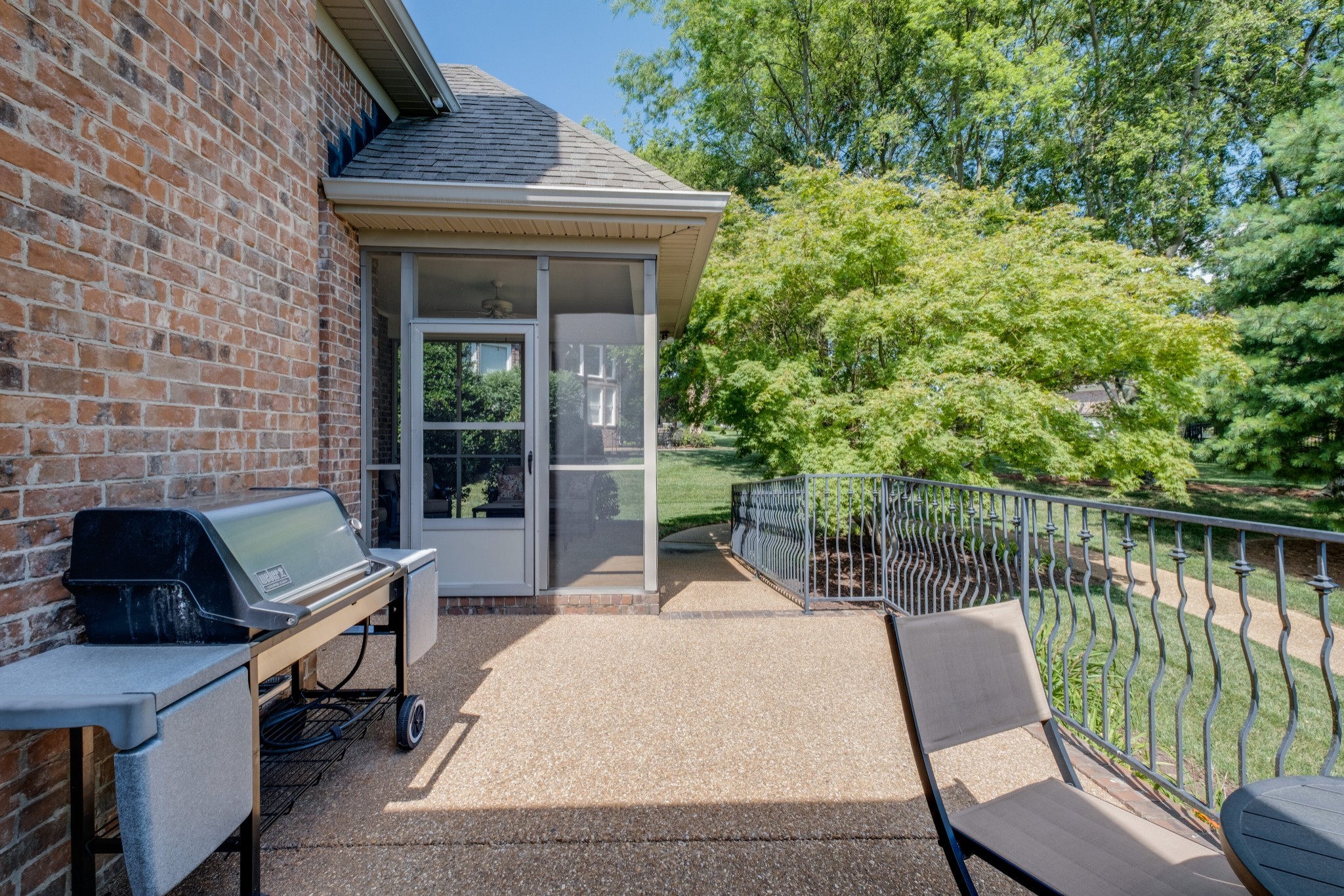 423 Ridgecrest Lane Lebanon, TN 37087 - Photo 44 of 50 a view of a patio with two chairs and a table
