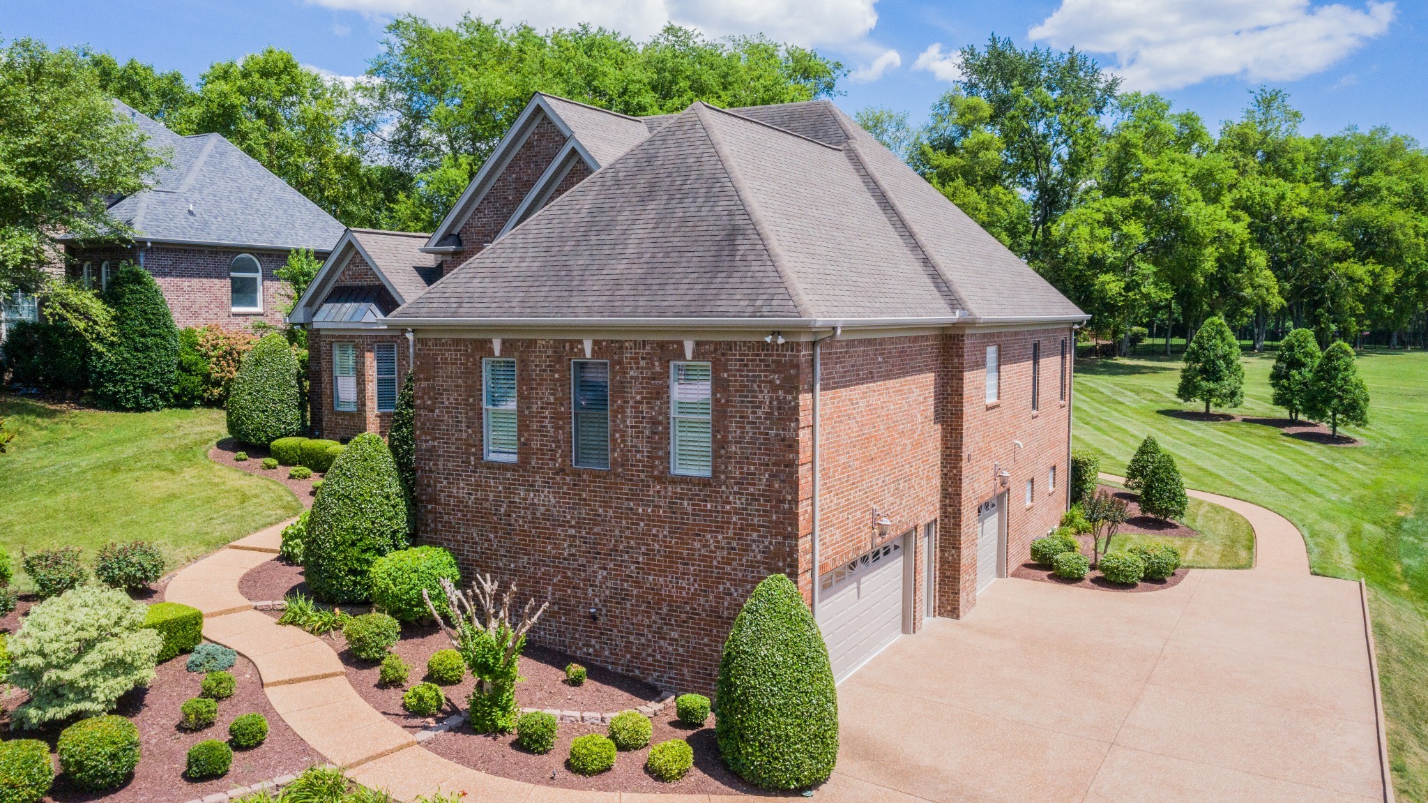 423 Ridgecrest Lane Lebanon, TN 37087 - Photo 5 of 50 a aerial view of a house with a yard plants and large tree