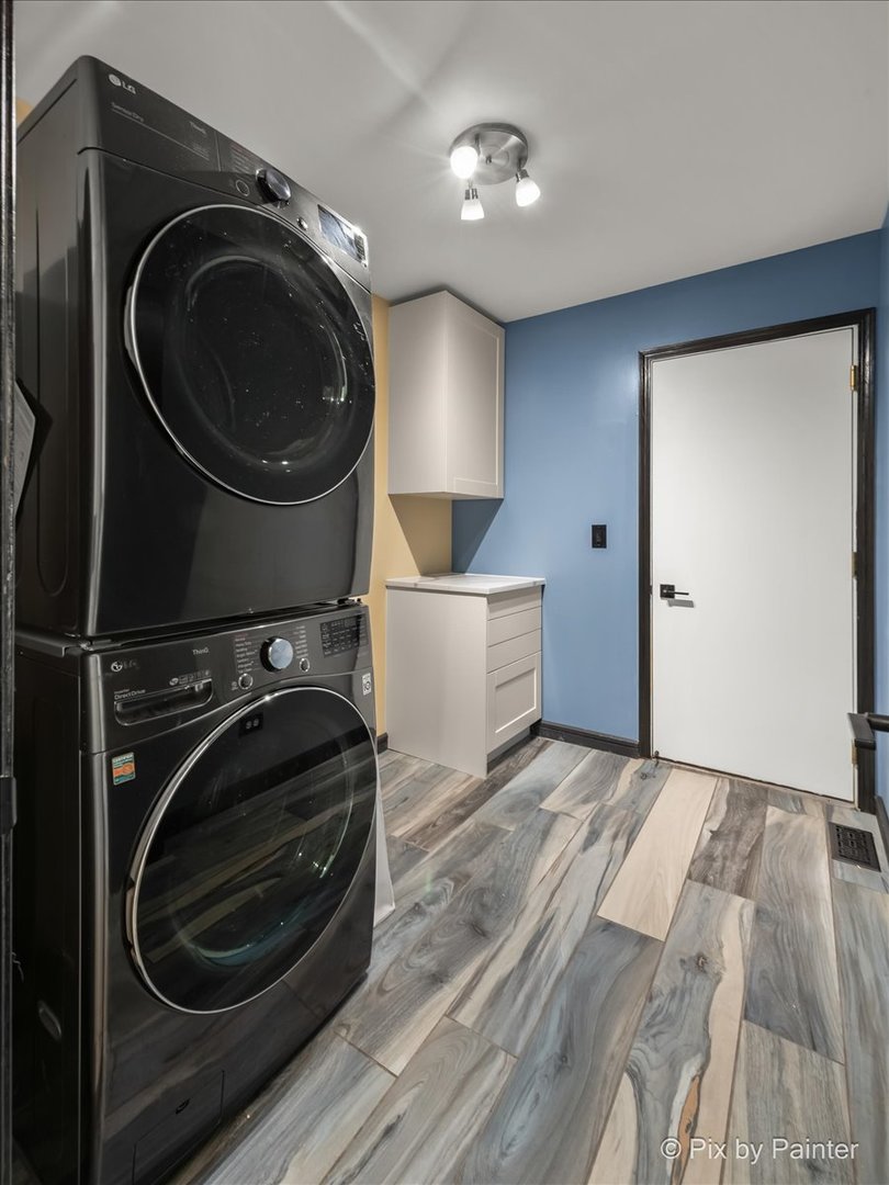 1812 Arbor Fields Drive Plainfield, IL 60586 - Photo 11 of 35 a view of a storage and utility room with washer and dryer