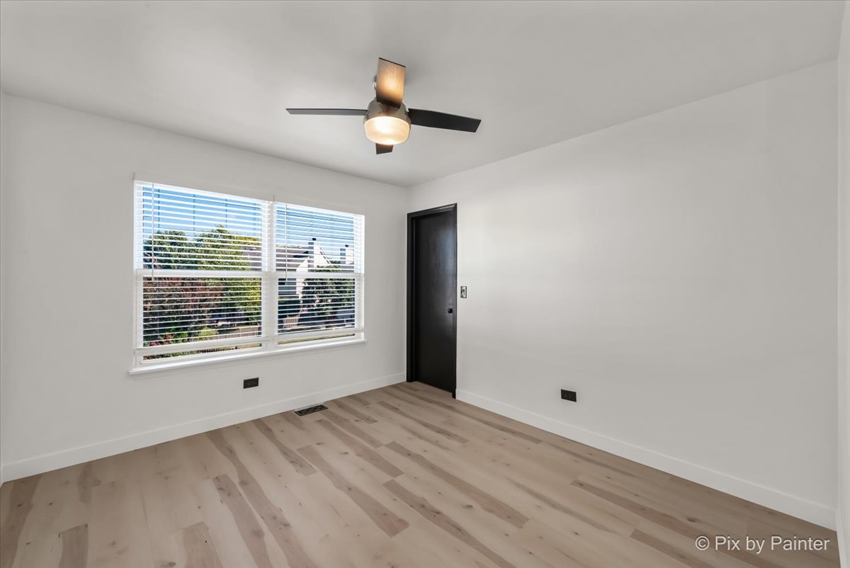 1812 Arbor Fields Drive Plainfield, IL 60586 - Photo 18 of 35 a view of an empty room with a window