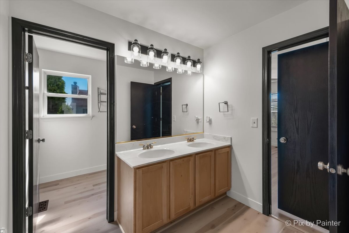 1812 Arbor Fields Drive Plainfield, IL 60586 - Photo 20 of 35 a bathroom with a sink and a mirror