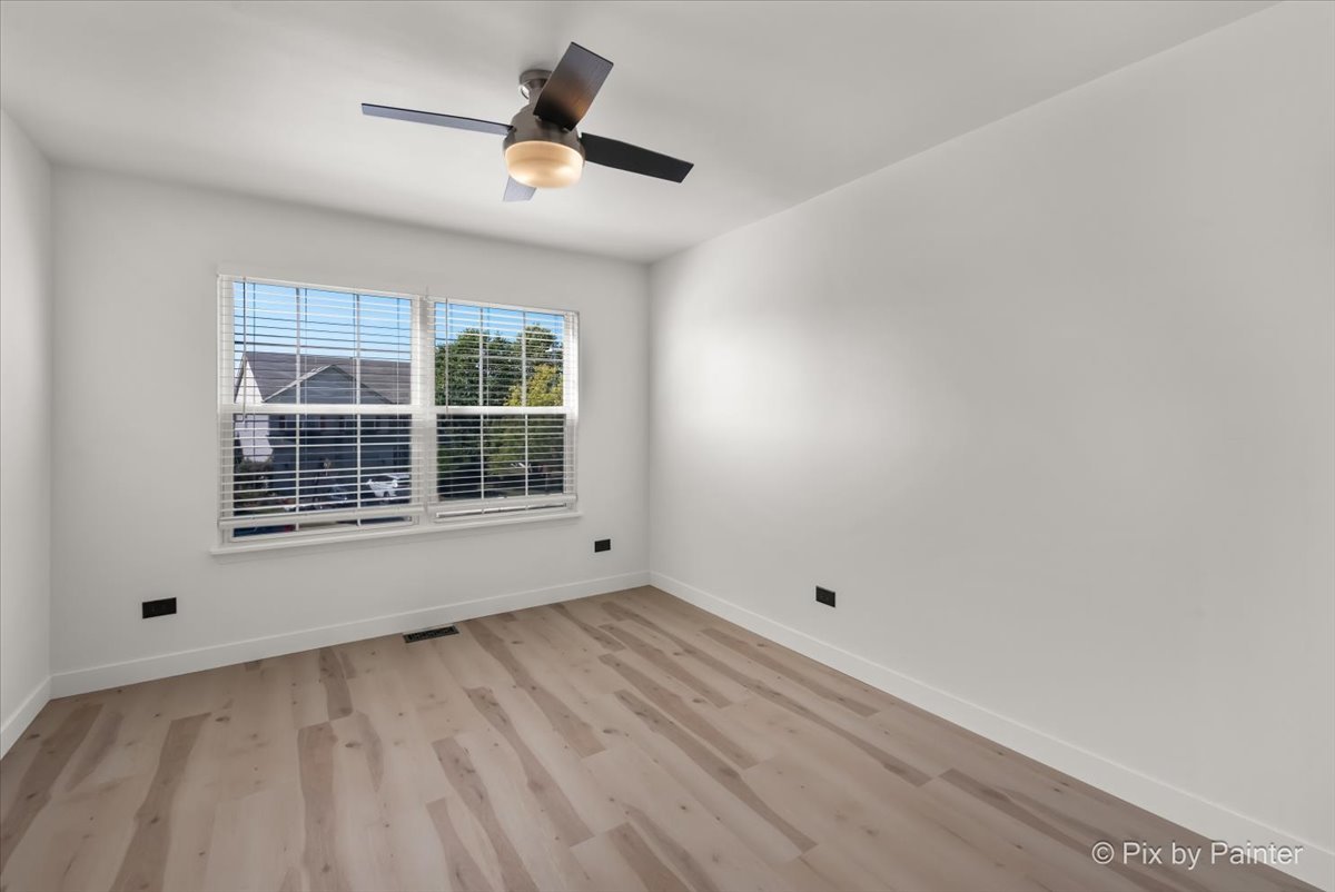 1812 Arbor Fields Drive Plainfield, IL 60586 - Photo 23 of 35 a view of an empty room with a window