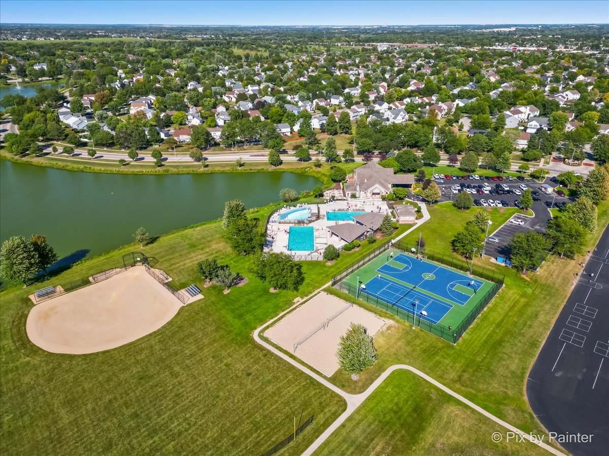 1812 Arbor Fields Drive Plainfield, IL 60586 - Photo 34 of 35 an aerial view of a house with a swimming pool