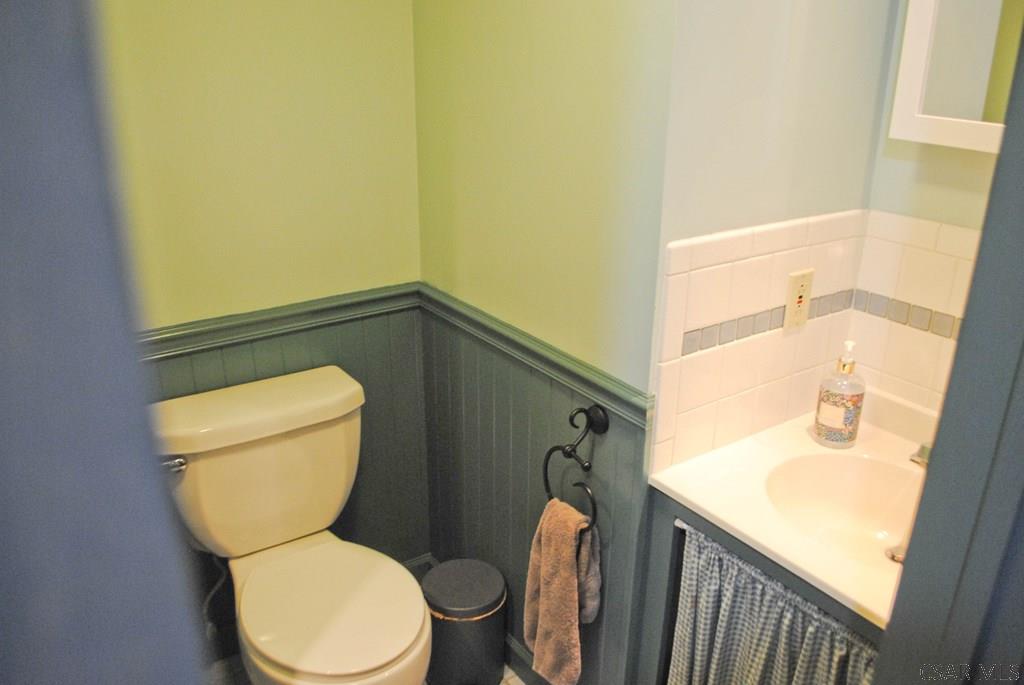 605 Griffith Road Seward, PA 15954 - Photo 40 of 45 a bathroom with a toilet and a sink