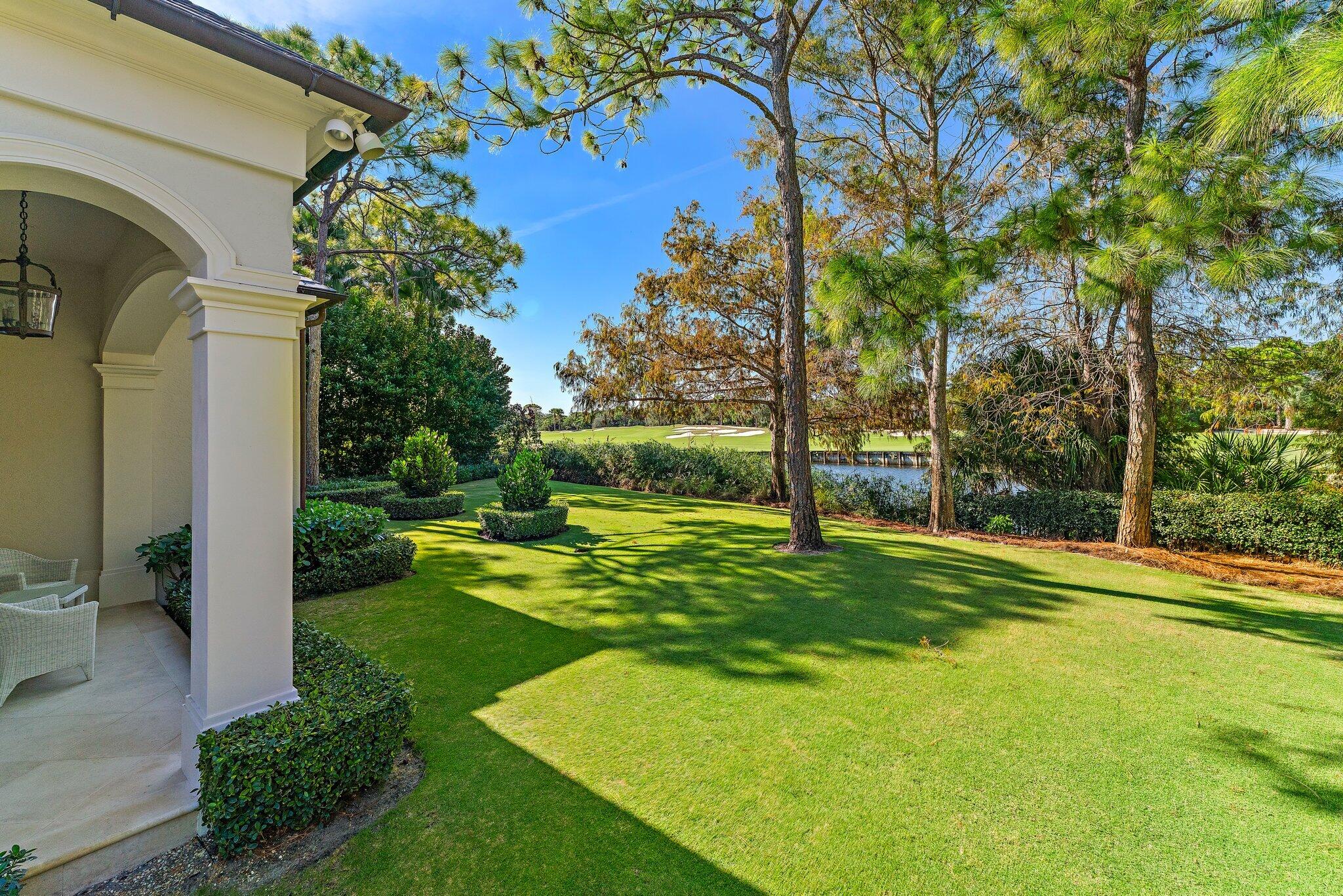 146 Bears Club Drive Jupiter, FL 33477 - Photo 99 of 115 Rear Lawn