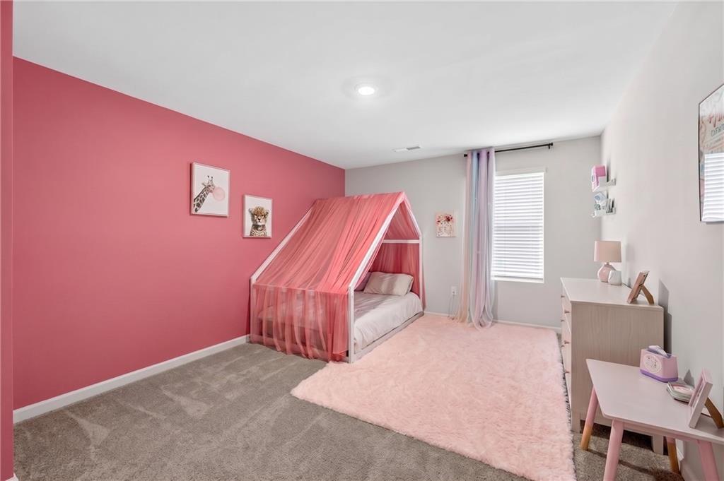 480 Overlook Road Covington, GA 30014 - Photo 10 of 20 a bedroom with a bed and a window