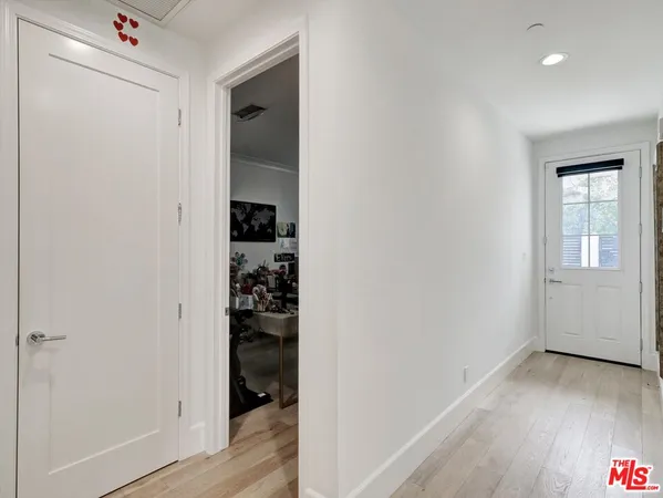 a view of a workspace with furniture