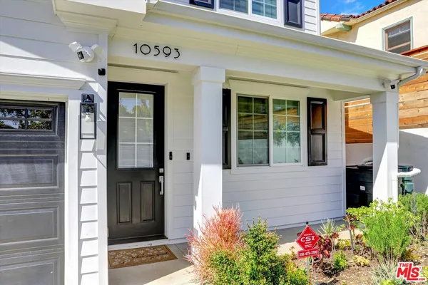 a view of a entryway door front of house