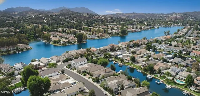 an aerial view of a town with couple of houses