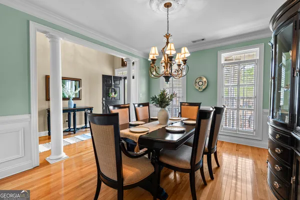 a kitchen with stainless steel appliances granite countertop a stove and cabinets