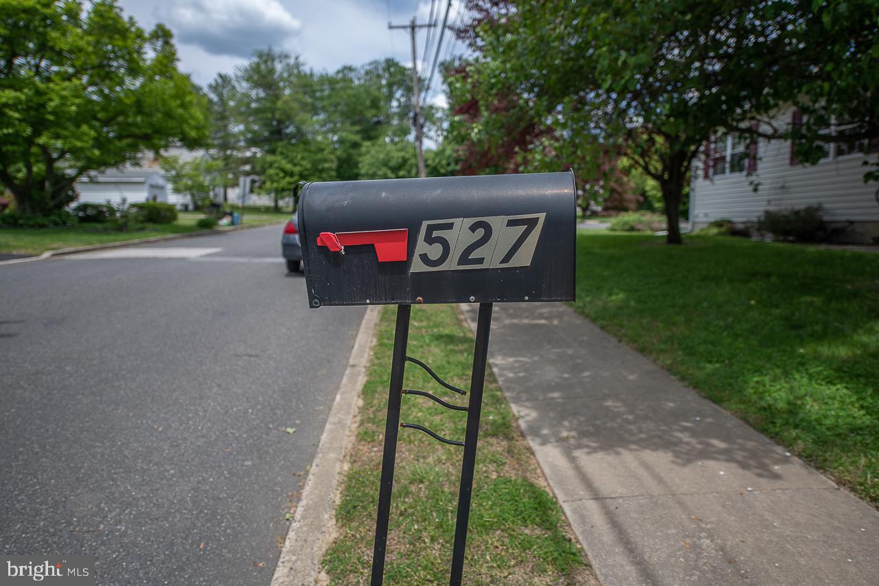 527 Schick Road Aston, PA 19014 - Photo 4 of 28 a sign board with a yard