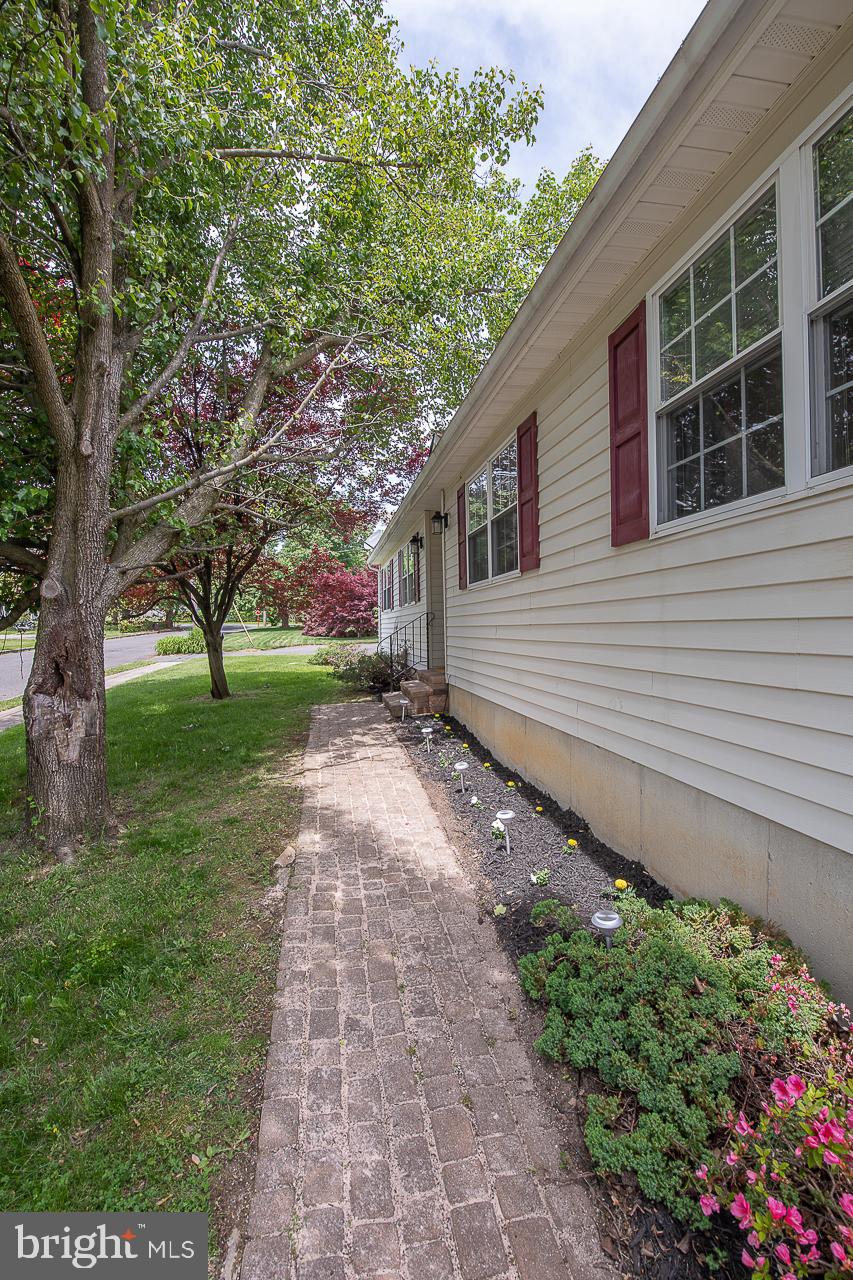 527 Schick Road Aston, PA 19014 - Photo 5 of 28 a front view of a house with garden