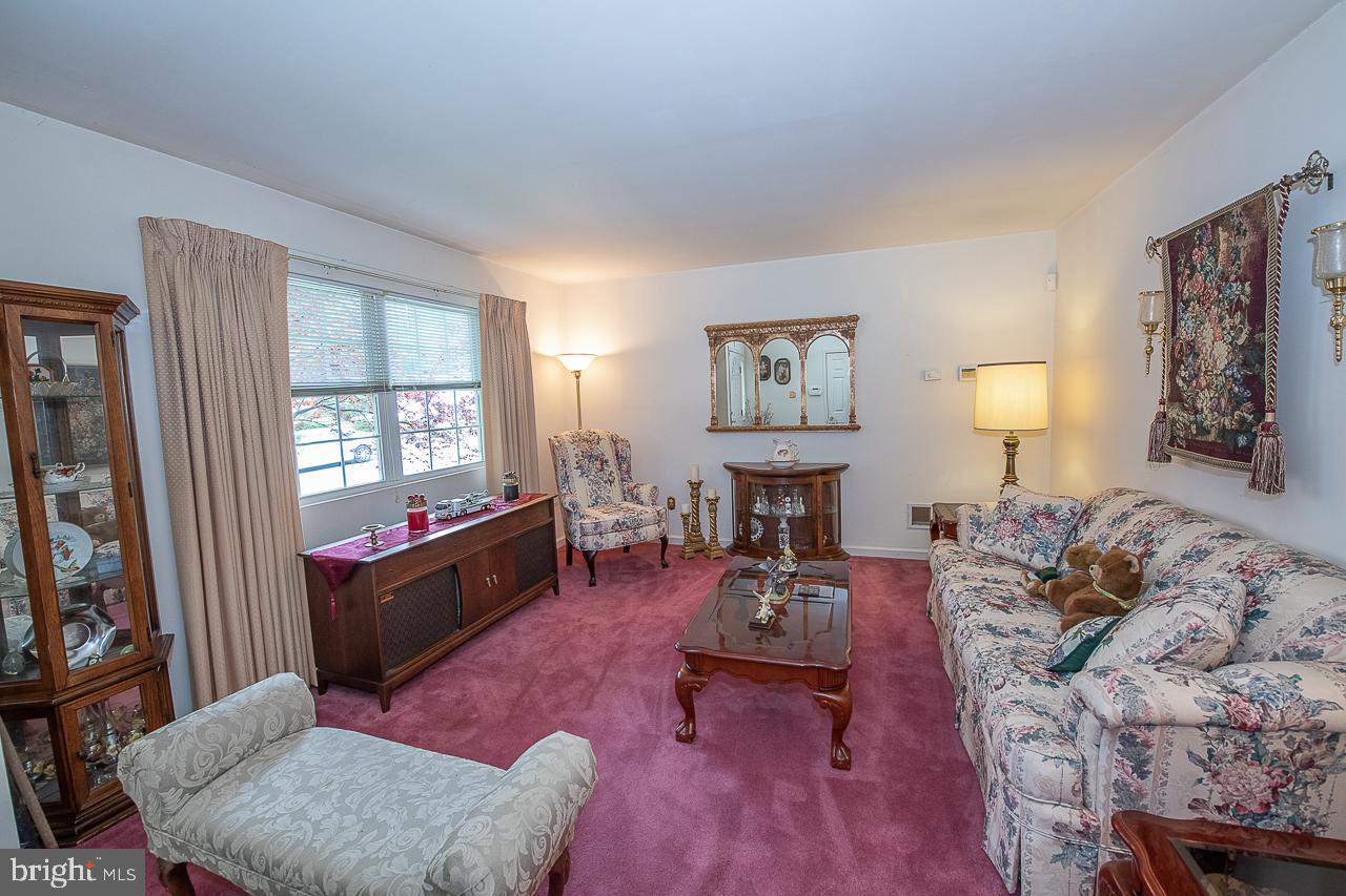 527 Schick Road Aston, PA 19014 - Photo 8 of 28 a living room with furniture rug and window
