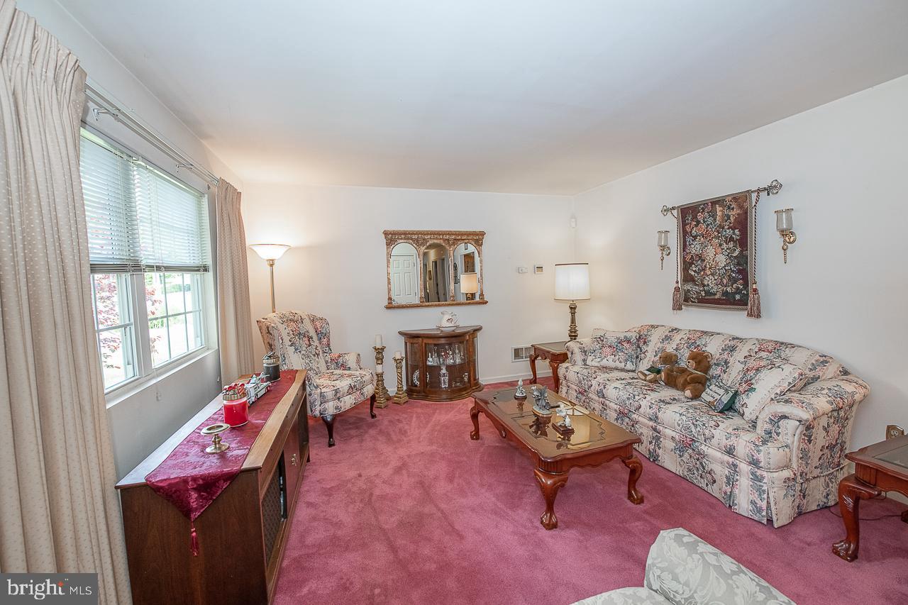 527 Schick Road Aston, PA 19014 - Photo 9 of 28 a living room with furniture and a large window