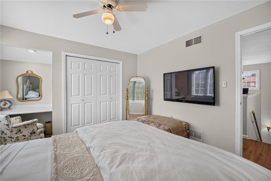 6467 Abbey Road Wind Gap, PA 18091 - Photo 33 of 46 A comforting bedroom with a practical built-in desk, showcasing functional design.