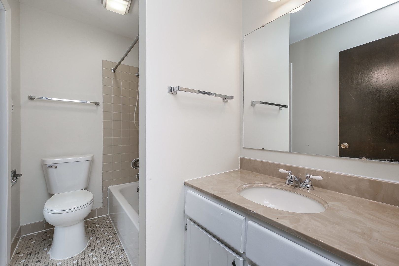 865 Sheldon Court, Unit C Wheaton, IL 60189 - Photo 13 of 17 a bathroom with a granite countertop sink toilet and shower