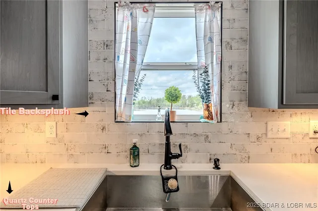 $549,900 | 735 Lake Of The Woods Drive, Macks Creek, MO 65786