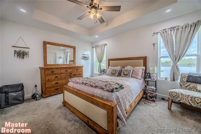 $549,900 | 735 Lake Of The Woods Drive, Macks Creek, MO 65786