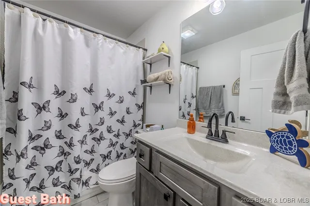 $549,900 | 735 Lake Of The Woods Drive, Macks Creek, MO 65786