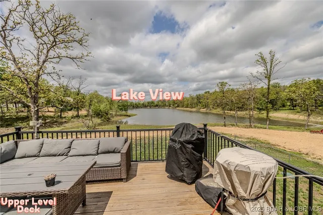 $549,900 | 735 Lake Of The Woods Drive, Macks Creek, MO 65786