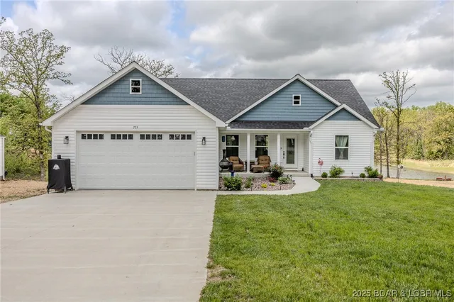 $549,900 | 735 Lake Of The Woods Drive, Macks Creek, MO 65786