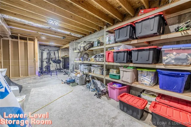 $549,900 | 735 Lake Of The Woods Drive, Macks Creek, MO 65786