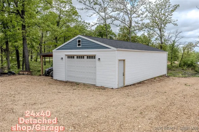 $549,900 | 735 Lake Of The Woods Drive, Macks Creek, MO 65786